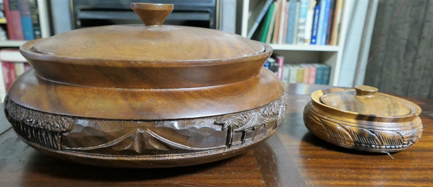 2 Wooden Island Carved Round Lidded Boxes - Largest Measures 6" tall 12" Across, Smaller 6" Across