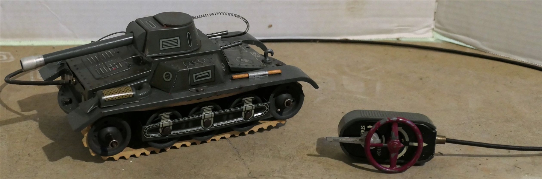 Gescha - Made in Western Germany - 65-6F - Battery Operated Remote Control Tank - Tin Litho - Rubber Track Wheels - Tank Measures 3" tall 8" by 4 1/2" 