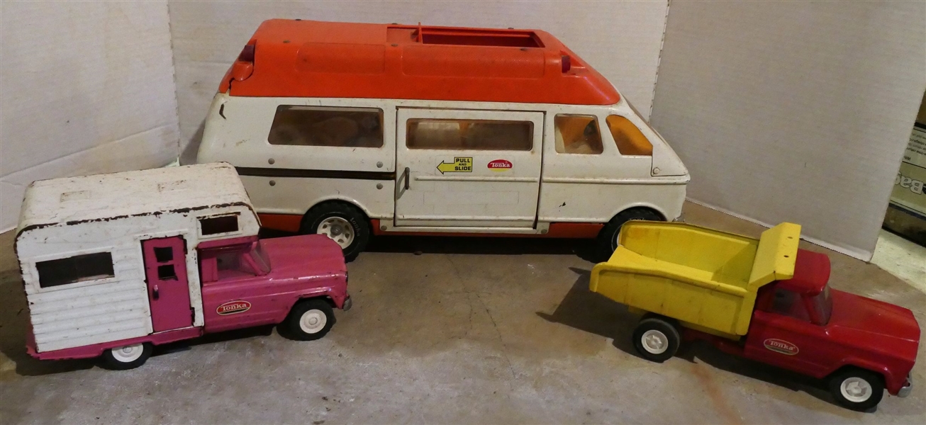 Lot of 3 Tonka Toys - Pink Camper, Red and Yellow Dump Truck, and Ambulance - with Tonka Patient and Stretcher - Ambulance Has Crack on Back Light -