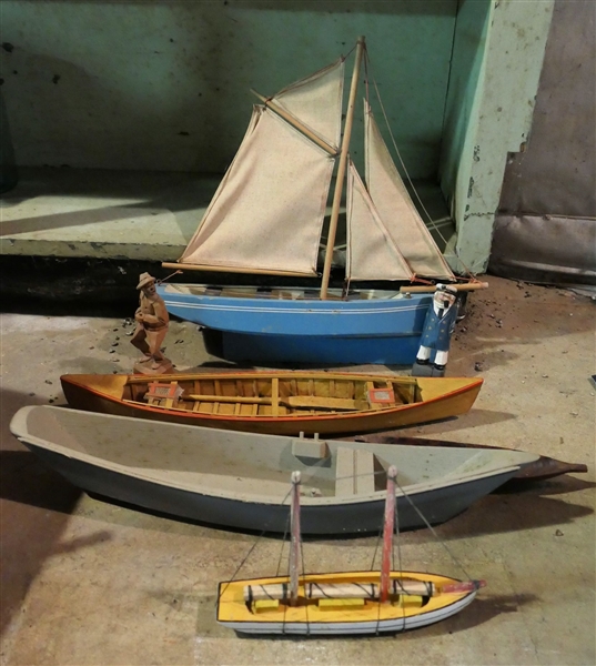 5 Smaller Wood Boat Models and 2 Carved Sailors - Blue Sailboat Measures 14" tall 15" Long Painted Sailor Measures 4" tall 