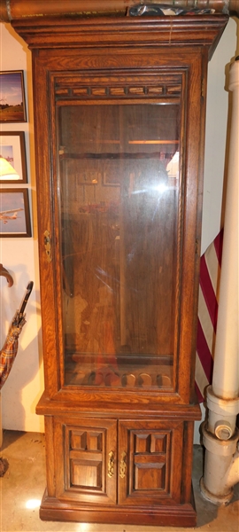 Oak Curio / Gun Cabinet - Locking Glass Door and Bottom Doors - Cabinet Measures 72 1/2" tall 27" by 17" 