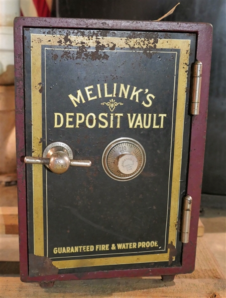 Meilinks Deposit Vault - Fire and Waterproof Safe - Red and Gold Painted - With Combination - Carrying Handle on Top - Measures 13" tall 9 1/2" by 10" 