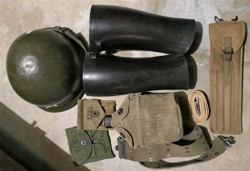 WWII Lot including Helmet with Colonel Symbol Added, Pair of Leather Gaiters, WWII Belt with Canteen, Gun Cleaning Kit, and 2 Clip Pouches 