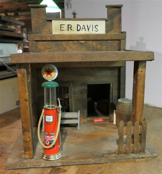 Folk Art "ER Davis Store" With Fence, Benches, Gas Pump, and Miniature Cash Register - Measures 14 1/2" tall 23" by 13"