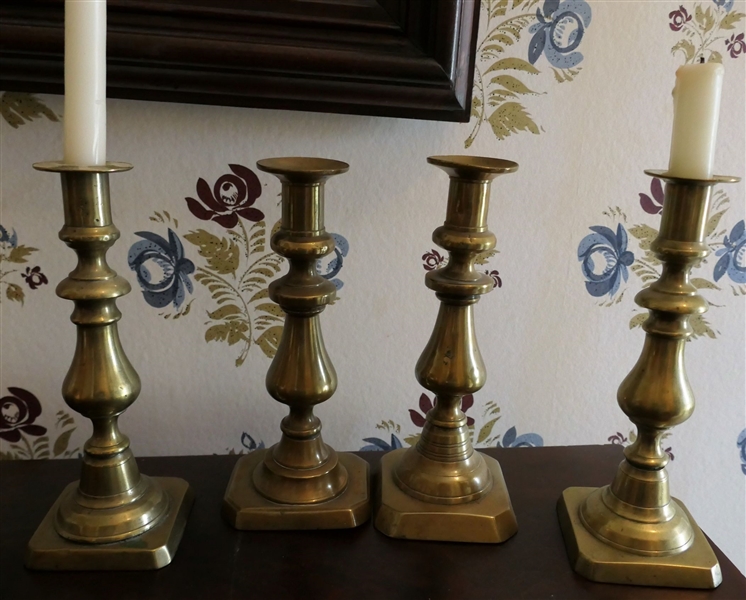 4 Brass Candle Sticks - Pair in Center Are Push Up - Tallest Measures 9" tall 
