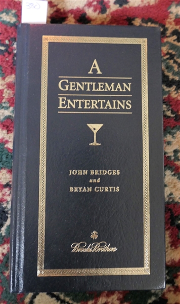 A Gentleman Entertains by John Bridges and Bryan Curtis - Leather Bound Hardcover Book With Gold Lettering and Pages - Published in 2000 For Brooks Brothers 