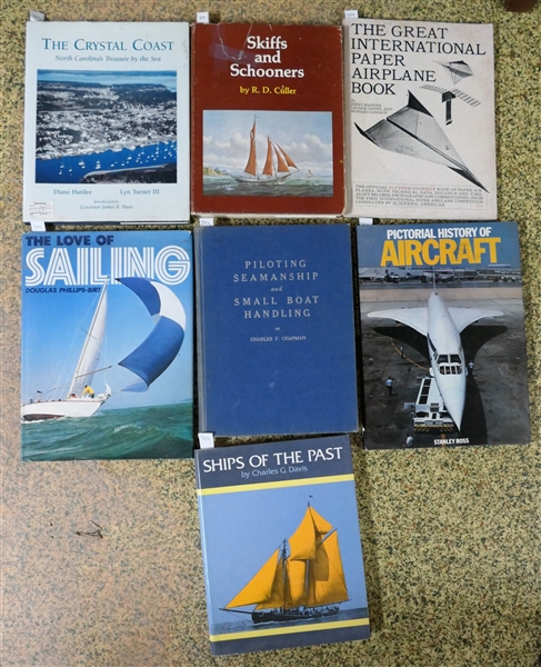 7 Books on Ships and Planes - Including "The Great International Paper Airplane Book" "A Pictorial History of Aircraft" "The Crystal Coast"  "The Love of Sailing" "Skiffs and Schooners" "Piloting...