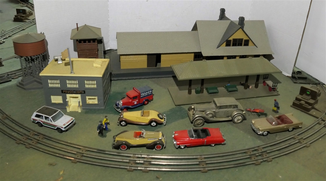 Lionel Train Station, Police Department, Water Tower, Watch Tower, Station, Figures, Benches, and Model Cars including Welly, Texaco, Castrol, Matchbox, Guisval, 