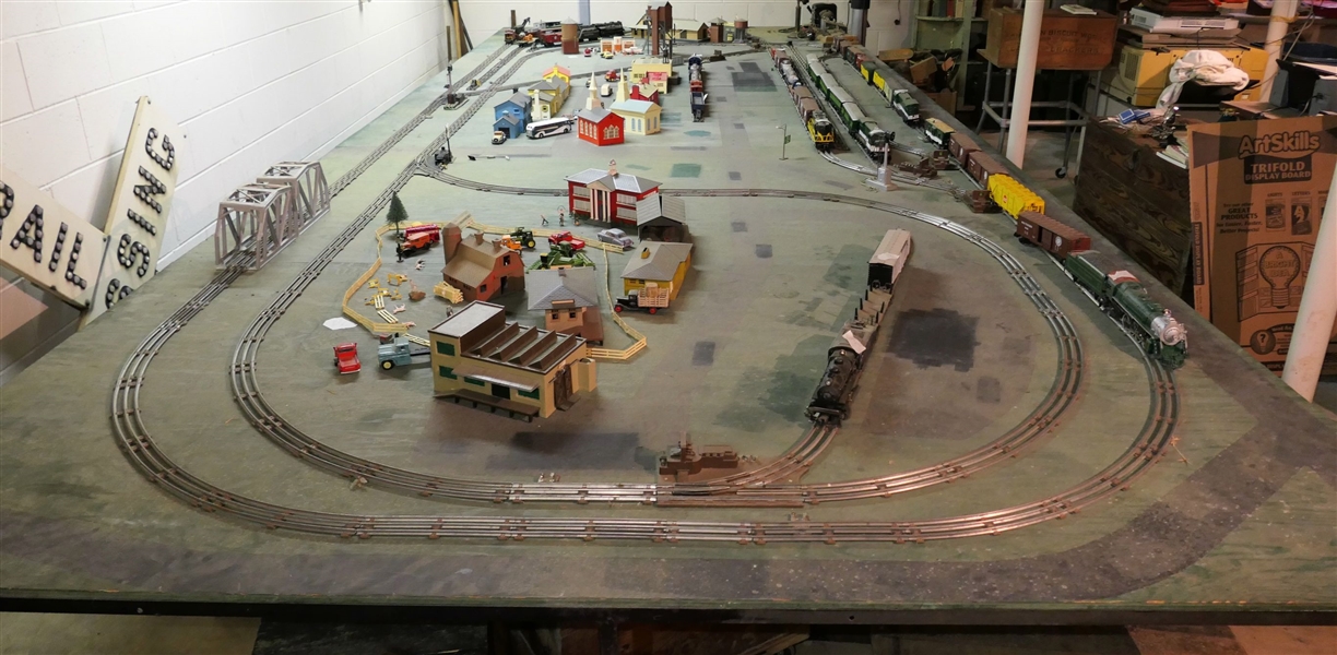 5 Painted Train Tables and Attached Track Switches, Bridges, Lights. Tables Have Metal Bases and Plywood Tops - Each Table Measures 29" tall 4 by 8 - Only Items Attached To Table - Nothing Else...