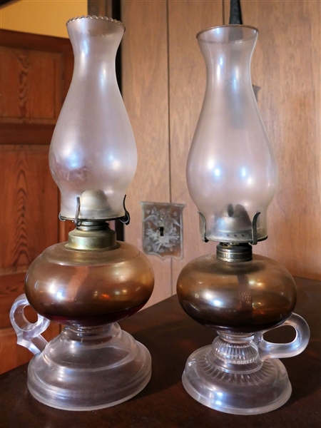 2 Finger Oil Lamps with Glass Chimneys - Both Measure Approx. 14" Tall 