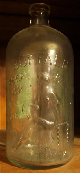 Buffalo Mineral Springs Water Bottle - Buffalo Girl With Leg Showing on Front - Partial Original Label on Back - Measures 10"