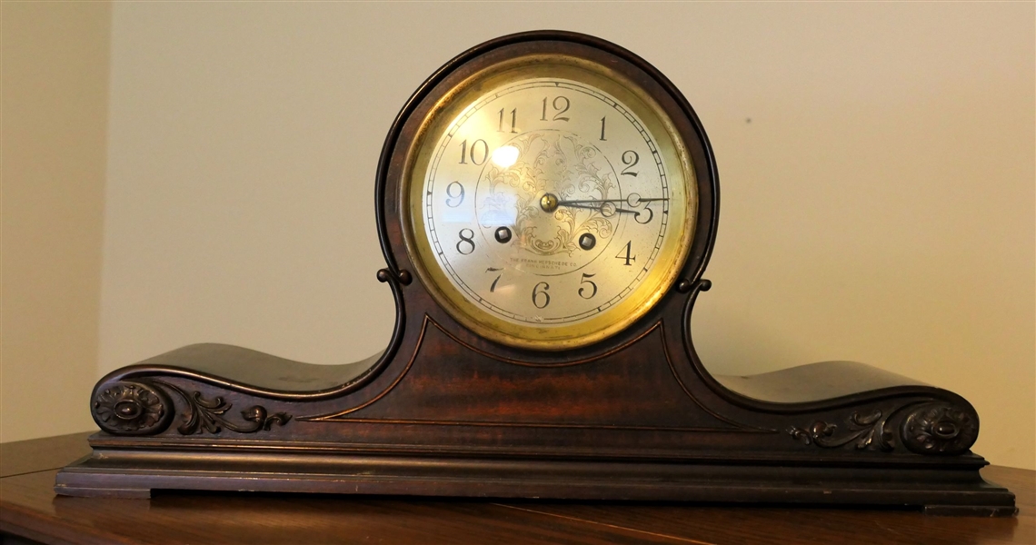 The Frank Herschede Co. Cincinnati -Mantle Clock - Mahogany Case - Floral Details on Ends - Measures 9 1/2" Tall 19 1/2" by 5 1/2"