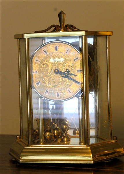 Kundo Anniversary Clock in Hexagon Shaped Glass and Metal Case - Etched Glass on Sides - Measures 9 1/2" tall 8" Across