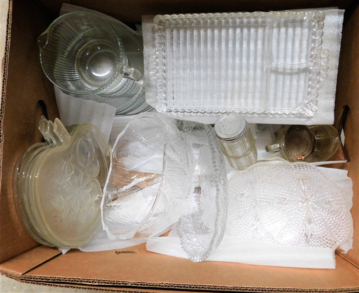 Box Lot of Clear Glassware including Bowls, Snack Plates, Apple Plates, Pitcher, and Jar