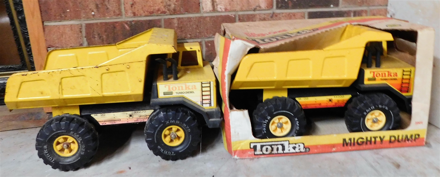 2 Metal Tonka Dump Trucks - 1 is in Original Box