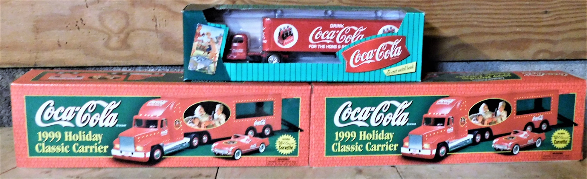 3 Coca Cola Collectible Trucks including Die Cast Bank and 2 1999 Holiday Classic Carriers with Corvettes