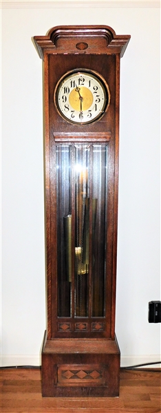 Mission Style Oak Tall Case Clock - Weight Driven -  Brass Emblem Inside - Missing Glass on Face - 1 Side Piece Has Been Repaired - 82" tall 18" by 10"