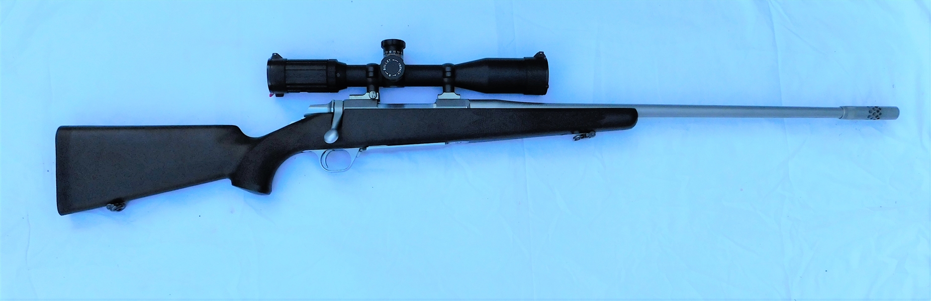 Browning 7mm Magnum Bolt Action Rifle - Stainless Steel - Factory Boss on End of Barrel - Made in Japan- Approximately 7 Rounds Fired - Butler Creek Scope -With Nitrogen Gas Port