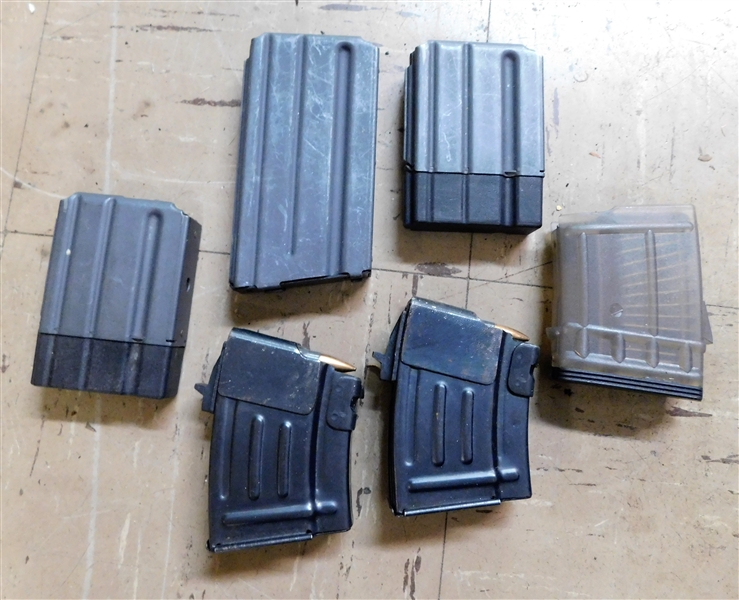 6 Rifle Magazines including 2 Metal Colt, 2 Metal China Loaded with 7.62 x 39 Bullets, 1 Colt 5.56mm, and 1 Plastic 9+1