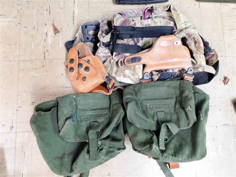 Green Canvas Military Pouch, Leather Galco Shoulder Holster, and Fieldline Camo Pouch