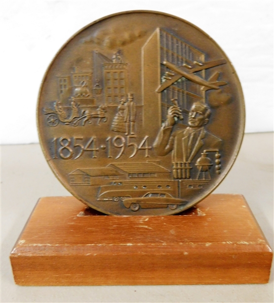1854- 1954  Barrett Centennial 100 Years of Experience Medallion on Wood Stand - Medal Measures 3" across 