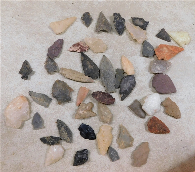 Lot of Arrowheads including Quartz, Lighter Pink, Orange, and Gray