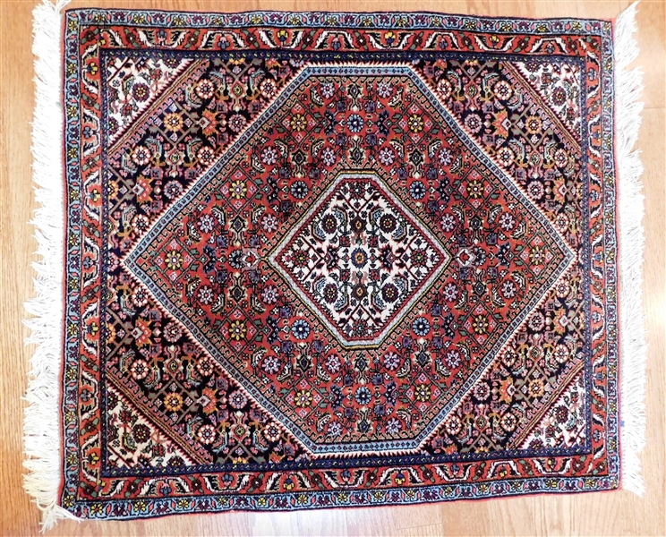 Finely Handwoven Rug with Navy and Reds - Intricate Floral Details - 34" by 30"