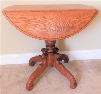 Round Oak Drop Leaf Occasional Table  - 29 1/2" tall 30" by 19" Bottom Detail has Been Repaired 