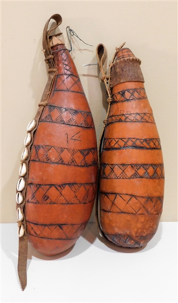2 Carved Gourd Canteens with Leather Tops and Straps with Puka Shells -Largest is Approx. 13" Long