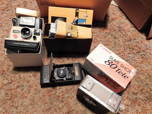 Box lot of Cameras including Kodak and Cannon 