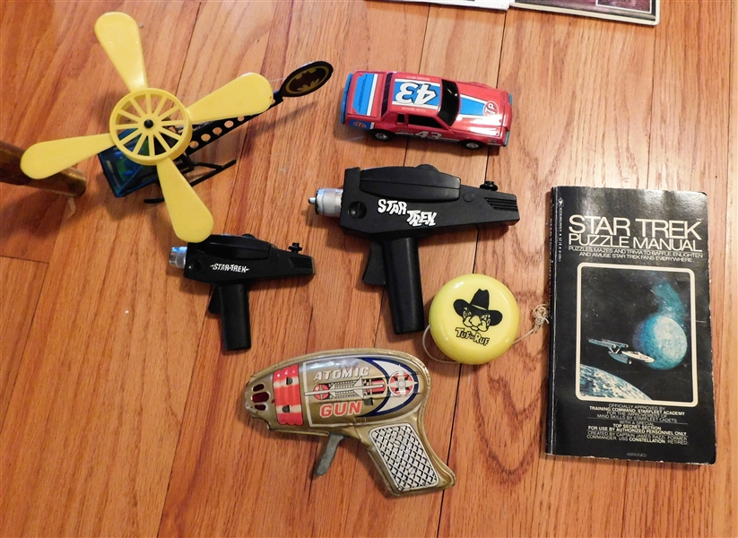 Star Trek Pistol, Tin Litho Atomic Gun, Batman Helicopter, Yoyo, Star Trex Puzzle Manual and Toy Car