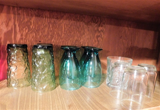 2 Shelves of Glassware including Pink, Purple, Green, and Clear 