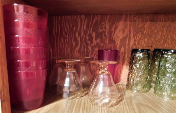 2 Shelves of Glassware including Pink, Purple, Green, and Clear 