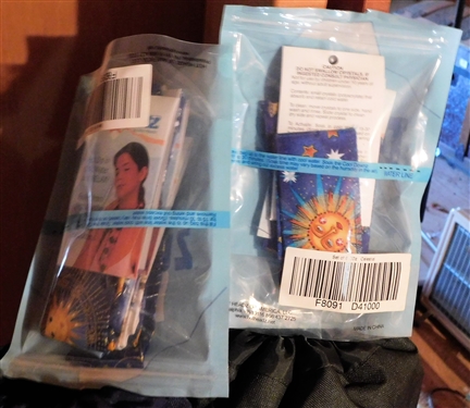 2 Folding Arm Chairs in Bags and  2 Packages of Cooling Neck Wraps