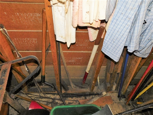 Contents of Tool Shed - including Seeder, Extension Ladder, Galvanized Buckets, Wood Ladder, Roxboro Tags, Yard Tools, Wheel Barrow, and Truck, Pick, Etc. 