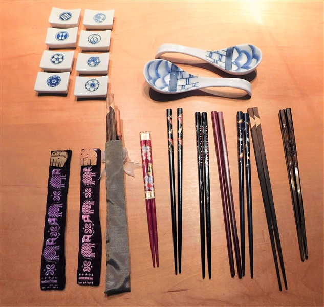 Lot of Chop Sticks, Blue and White China Holders, and Soup Spoons