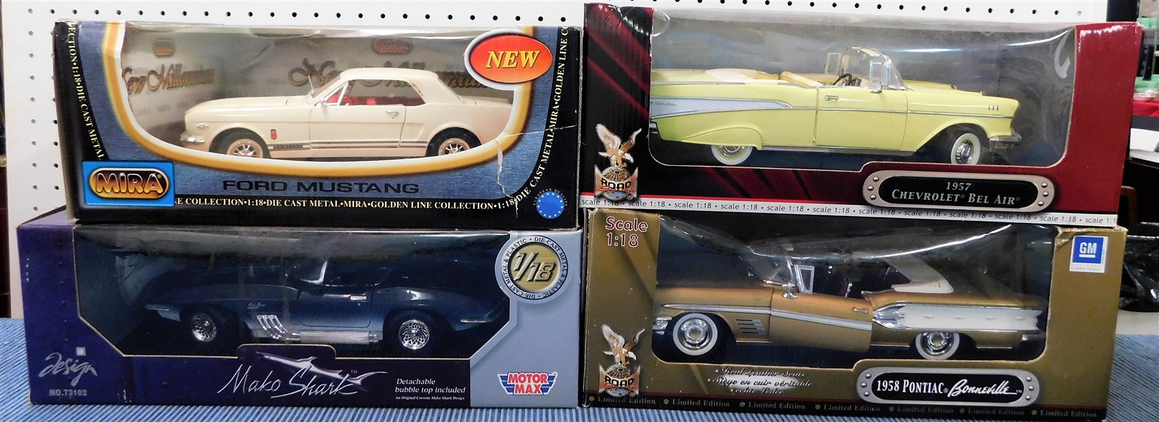 New in Original Boxes 1/18 Scale Model Cars - New Millennium Mustang, Mako Shark Corvette, 1957 Bel Air, and 1958 Bonneville