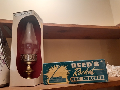 Rowenta Iron, Candle Lamp, and Rocket Nut Cracker