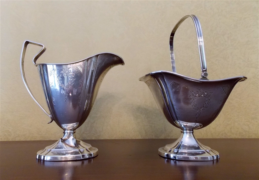 Sterling Silver Cream Pitcher and Waste Basket - Both with Floral Details - Pitcher is Dented - Pitcher Measures 4 3/4" tall 5" Spout to Handle