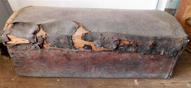 Hand Tooled Leather Wrapped Wood Trunk - Rough Condition - Original Lock - Black Smith Handles - Measures 16 tall 42 by 22