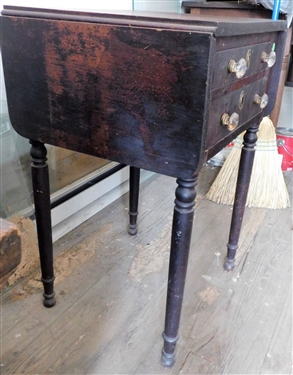 2 Drawer Drop Side Table - Original Finish - Glass Knobs - Some Veneer Loss - 29 tall 27 by 20 -Each Leaf Measures 9 - Top Drawer is Divided - 1 Knob Needs a Screw