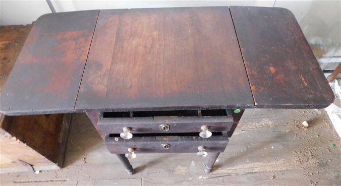 2 Drawer Drop Side Table - Original Finish - Glass Knobs - Some Veneer Loss - 29 tall 27 by 20 -Each Leaf Measures 9 - Top Drawer is Divided - 1 Knob Needs a Screw