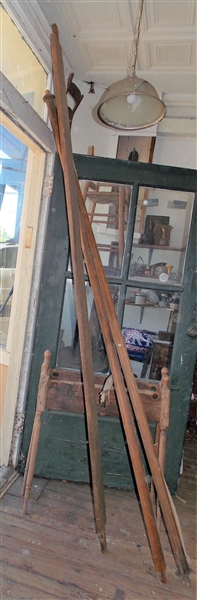 Primitive Wood Implement with Metal Wheels on Ends of Posts - Wood Pieces with Turned Legs Measure 35" by 31"