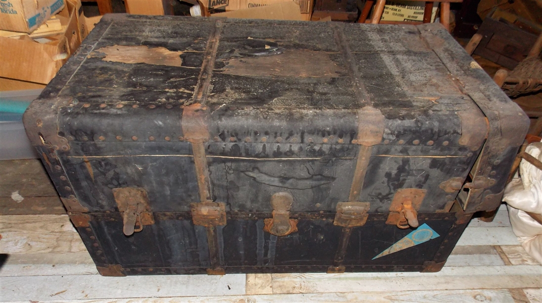 Leather Wrapped Steamer Trunk and Contents -  Leather is Torn - Measures 22 1/2" tall 40 1/2" by 21 1/2"