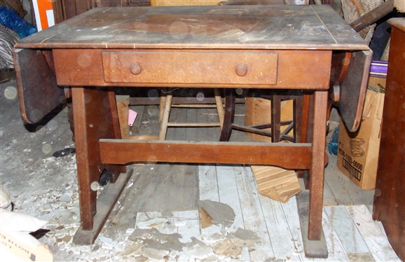 Drop Sides Trestle Table with Drawer - Top Finish Is Stained - Table Measures 29 1/2 tall 39 by 28 - Leaves Measure 10