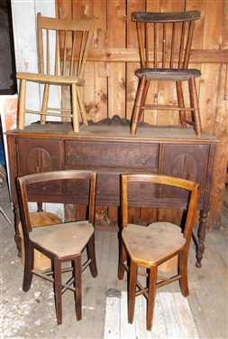 1930's Sideboard and 4 Mix Matched Chairs including 2 Triangle Chairs and 2 Plank Bottom - Sideboard Has Some Veneer Issues and Is Missing Pulls - Sideboard Measures - 37 tall 54 by 18