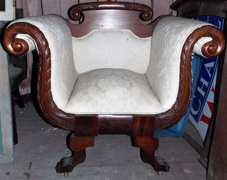 Claw Foot Barrel Chair with Scrolled Arms and Carved Details - Upholstery is Torn on Back Corner - Chair Measures 30" tall 36" by 24"