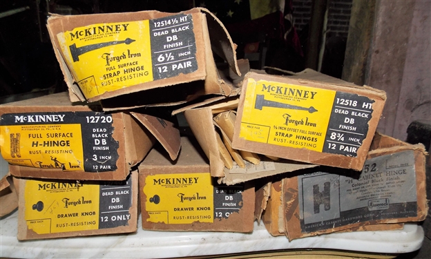 7 Boxes of Hinges and Knobs by McKinney Forged Iron including Strap Hinges, H Hinge, and Drawer Knobs all in Original Packaging - Mostly Full