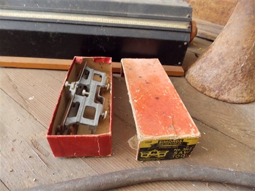 Wood Counter, Blacksmith Tool, Simons Saw and Steel Co Tool, and Jack Stand