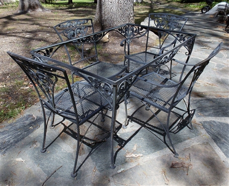 Metal Garden Table and 4 Chairs - Flower Motif - 2 Chairs are Captains - Table Does Not Have Top  - Measures 28 1/2" tall  48 1/2" by 30 1/2"